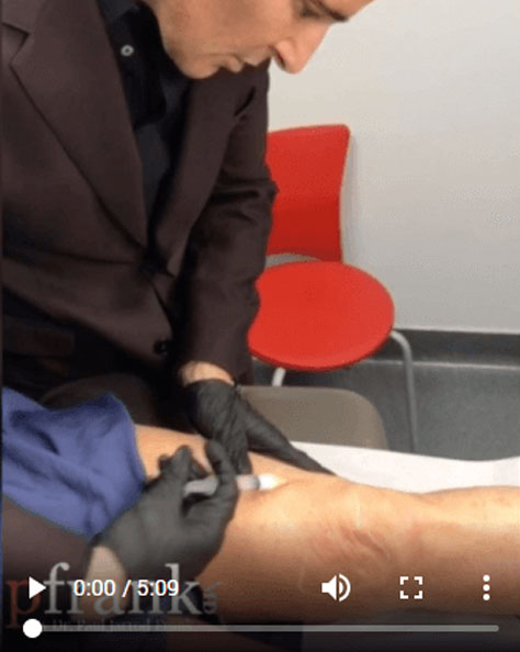 Dr. Paul Jarrod Frank of PFRANKMD injecting client Dr. Paul Jarrod Frank of PFRANKMD injecting client