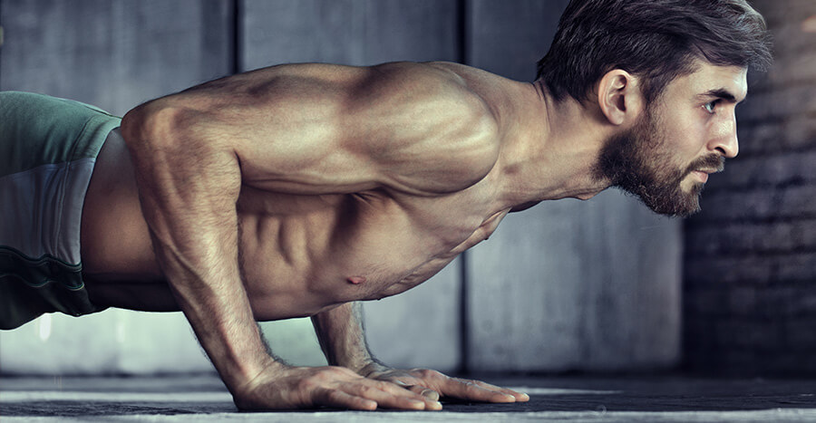 Fit man doing push-ups Fit man doing push-ups